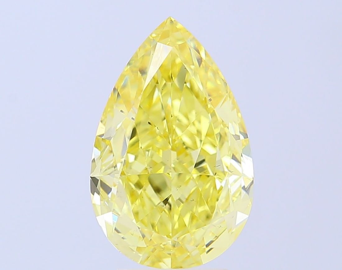 Loose Diamond - PEAR 6.04ct Fancy Vivid Yellow VS2: Loose Diamond - PEAR 6.04ct Fancy Vivid Yellow VS2 Source: This is a real non-mined Diamond that has been grown in a lab Shape: PEAR Carats: 6.04 Color: Fancy Vivid Yellow Certification: IGI Video: