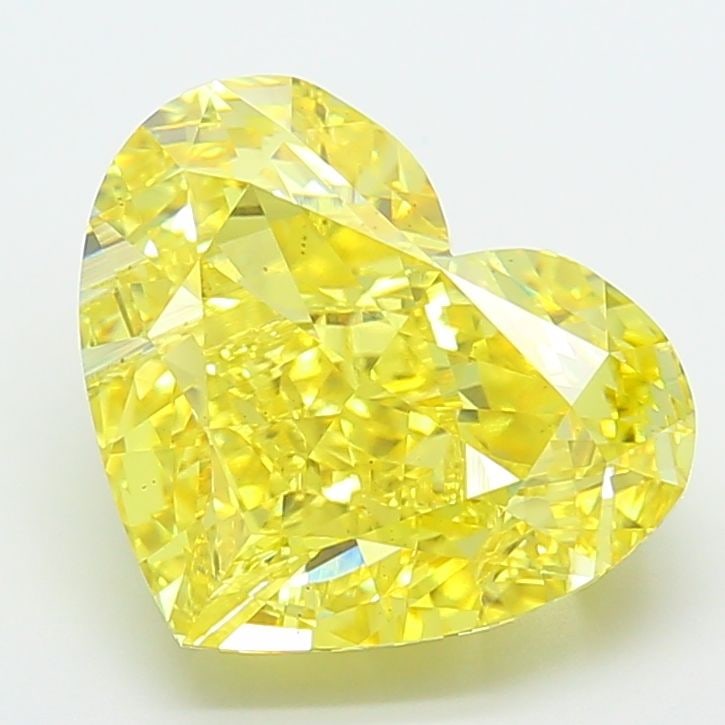 Loose Diamond - HEART 8.53ct Fancy Vivid Yellow VS2: Loose Diamond - HEART 8.53ct Fancy Vivid Yellow VS2 Source: This is a real non-mined Diamond that has been grown in a lab Shape: HEART Carats: 8.53 Color: Fancy Vivid Yellow Certification: IGI Video: