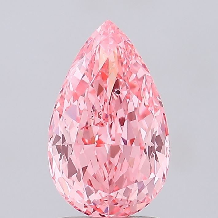 Loose Diamond - PEAR 2.1ct Fancy Vivid Pink SI1: Loose Diamond - PEAR 2.1ct Fancy Vivid Pink SI1 Source: This is a real non-mined Diamond that has been grown in a lab Shape: PEAR Carats: 2.1 Color: Fancy Vivid Pink Certification: IGI Video: