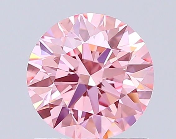 Ideal Loose Diamond - ROUND 1.03ct Fancy Vivid Pink VVS2: Ideal Loose Diamond - ROUND 1.03ct Fancy Vivid Pink VVS2 Source: This is a real non-mined Diamond that has been grown in a lab Shape: ROUND Carats: 1.03 Color: Fancy Vivid Pink Certification: IGI Vide