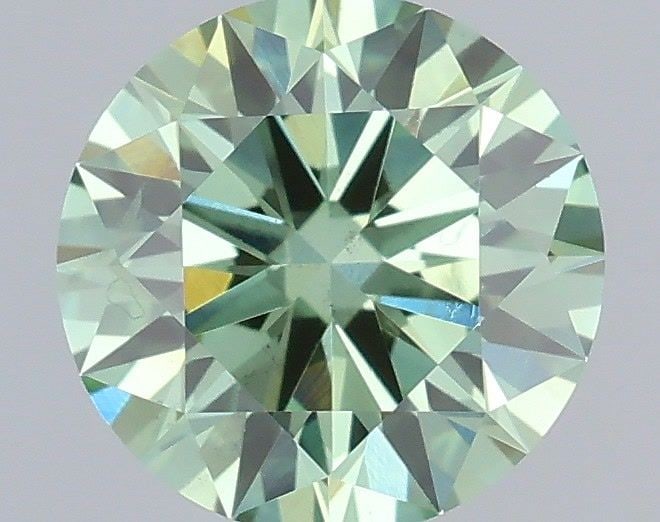 Ideal Loose Diamond - ROUND 0.7ct Fancy Vivid Green VS2: Ideal Loose Diamond - ROUND 0.7ct Fancy Vivid Green VS2 Source: This is a real non-mined Diamond that has been grown in a lab Shape: ROUND Carats: 0.7 Color: Fancy Vivid Green Certification: IGI Video