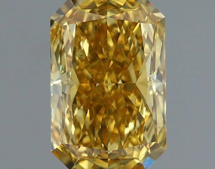 Loose Diamond - RADIANT 1.3ct Fancy Vivid Yellow VS1: Loose Diamond - RADIANT 1.3ct Fancy Vivid Yellow VS1 Source: This is a real non-mined Diamond that has been grown in a lab Shape: RADIANT Carats: 1.3 Color: Fancy Vivid Yellow Certification: IGI Video