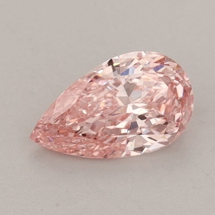 Loose Diamond - PEAR 0.61ct Fancy Vivid Pink VS1: Loose Diamond - PEAR 0.61ct Fancy Vivid Pink VS1 Source: This is a real non-mined Diamond that has been grown in a lab Shape: PEAR Carats: 0.61 Color: Fancy Vivid Pink Certification: IGI Video: