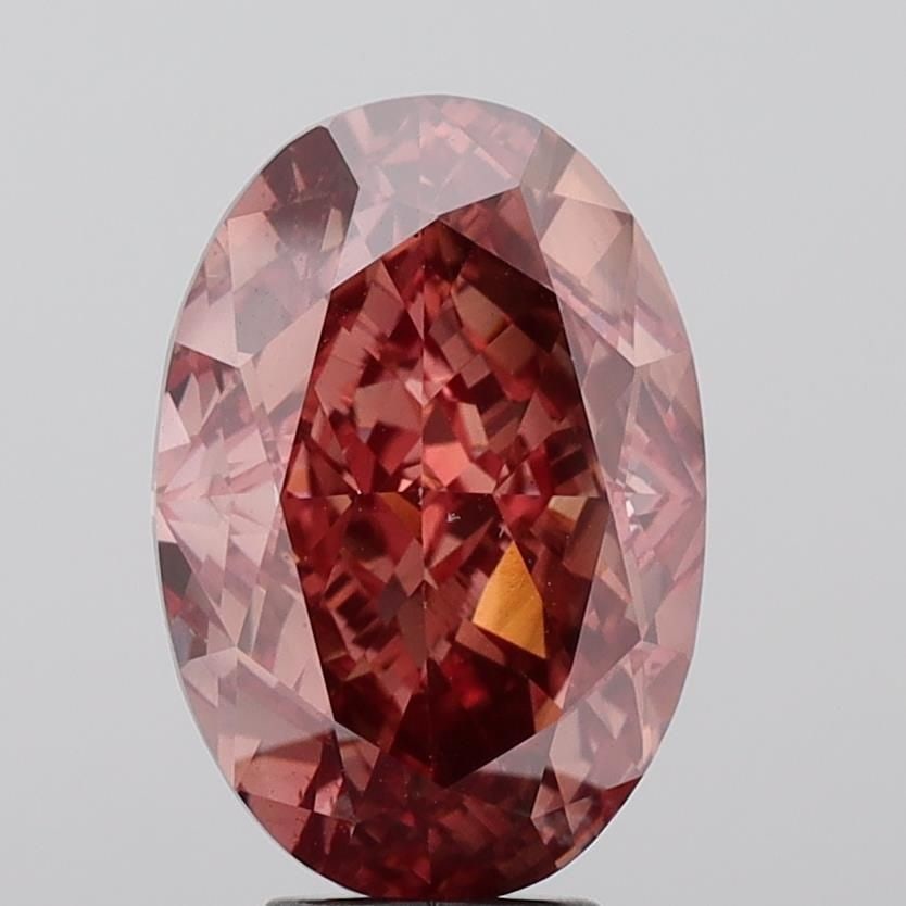 Loose Diamond - OVAL 9.81ct Fancy Vivid Brownish Pink VS1: Loose Diamond - OVAL 9.81ct Fancy Vivid Brownish Pink VS1 Source: This is a real non-mined Diamond that has been grown in a lab Shape: OVAL Carats: 9.81 Color: Fancy Vivid Brownish Pink Certification: