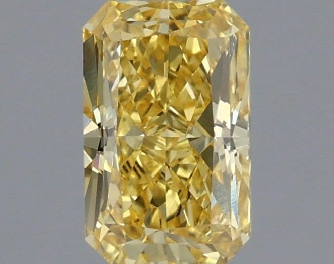Loose Diamond - RADIANT 0.51ct Fancy Vivid Yellow VVS2: Loose Diamond - RADIANT 0.51ct Fancy Vivid Yellow VVS2 Source: This is a real non-mined Diamond that has been grown in a lab Shape: RADIANT Carats: 0.51 Color: Fancy Vivid Yellow Certification: IGI Vi
