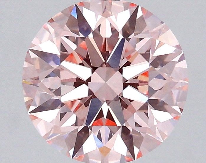 Loose Diamond - ROUND 2.2ct Fancy Vivid Pink VVS2: Loose Diamond - ROUND 2.2ct Fancy Vivid Pink VVS2 Source: This is a real non-mined Diamond that has been grown in a lab Shape: ROUND Carats: 2.2 Color: Fancy Vivid Pink Certification: IGI Video: