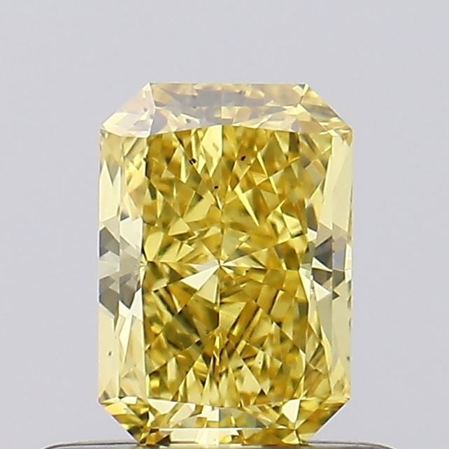 Loose Diamond - RADIANT 0.5ct Fancy Vivid Yellow VS2: Loose Diamond - RADIANT 0.5ct Fancy Vivid Yellow VS2 Source: This is a real non-mined Diamond that has been grown in a lab Shape: RADIANT Carats: 0.5 Color: Fancy Vivid Yellow Certification: IGI Video