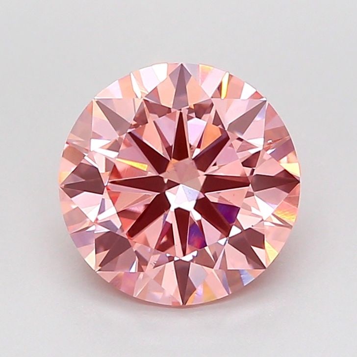 Ideal Loose Diamond - ROUND 2.01ct Fancy Vivid Pink VS1: Ideal Loose Diamond - ROUND 2.01ct Fancy Vivid Pink VS1 Source: This is a real non-mined Diamond that has been grown in a lab Shape: ROUND Carats: 2.01 Color: Fancy Vivid Pink Certification: IGI Video