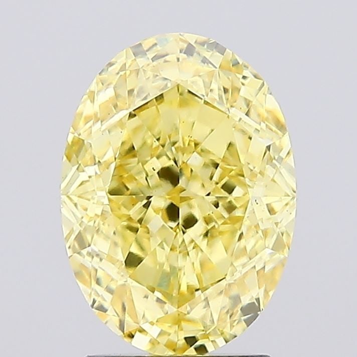 Loose Diamond - OVAL 2.59ct Fancy Vivid Yellow VS2: Loose Diamond - OVAL 2.59ct Fancy Vivid Yellow VS2 Source: This is a real non-mined Diamond that has been grown in a lab Shape: OVAL Carats: 2.59 Color: Fancy Vivid Yellow Certification: IGI Video: