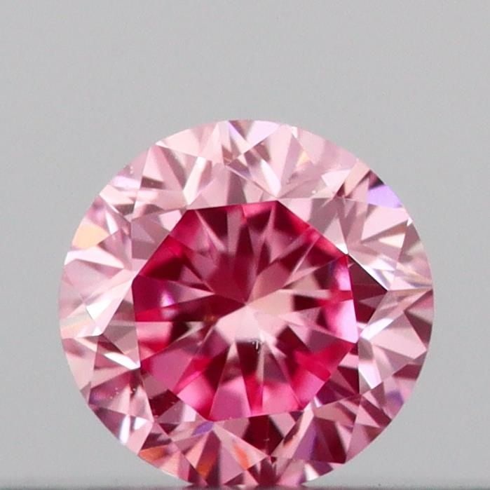 Loose Diamond - ROUND 0.12ct Fancy Vivid Pink VS1: Loose Diamond - ROUND 0.12ct Fancy Vivid Pink VS1 Source: This is a real non-mined Diamond that has been grown in a lab Shape: ROUND Carats: 0.12 Color: Fancy Vivid Pink Certification: IGI Video: