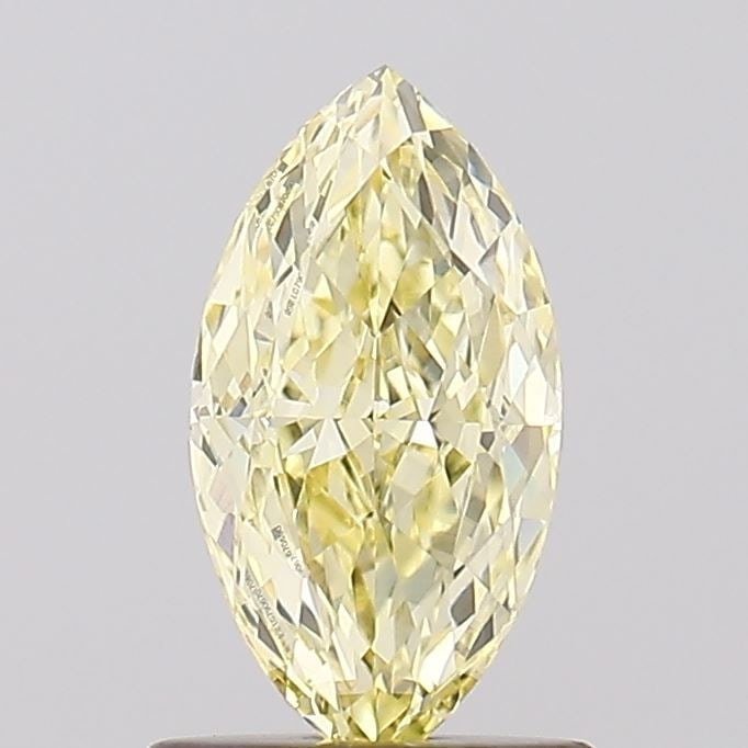 Loose Diamond - MARQUISE 1.0ct Fancy Yellow VVS2: Loose Diamond - MARQUISE 1.0ct Fancy Yellow VVS2 Source: This is a real non-mined Diamond that has been grown in a lab Shape: MARQUISE Carats: 1.0 Color: Fancy Yellow Certification: IGI Video: