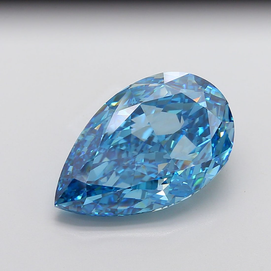 Loose Diamond - PEAR 18.06ct Fancy Vivid Blue VS1: Loose Diamond - PEAR 18.06ct Fancy Vivid Blue VS1 Source: This is a real non-mined Diamond that has been grown in a lab Shape: PEAR Carats: 18.06 Color: Fancy Vivid Blue Certification: IGI Video: