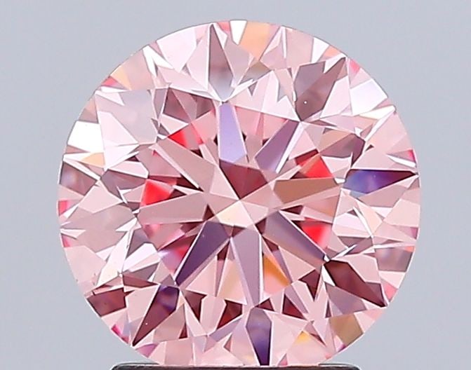 Loose Diamond - ROUND 2.52ct Fancy Vivid Pink VS1: Loose Diamond - ROUND 2.52ct Fancy Vivid Pink VS1 Source: This is a real non-mined Diamond that has been grown in a lab Shape: ROUND Carats: 2.52 Color: Fancy Vivid Pink Certification: IGI Video:
