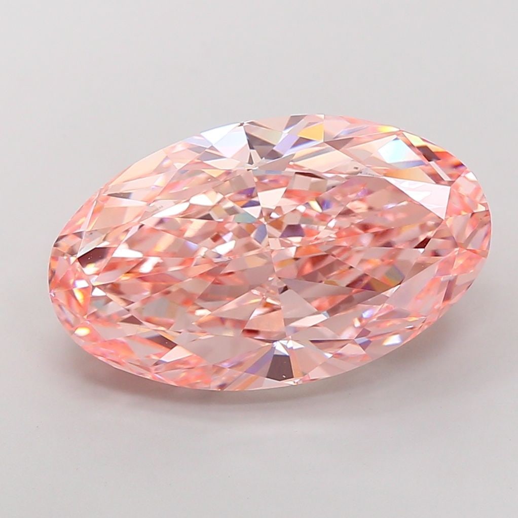 Loose Diamond - OVAL 15.07ct Fancy Vivid Pink VS1: Loose Diamond - OVAL 15.07ct Fancy Vivid Pink VS1 Source: This is a real non-mined Diamond that has been grown in a lab Shape: OVAL Carats: 15.07 Color: Fancy Vivid Pink Certification: IGI Video:
