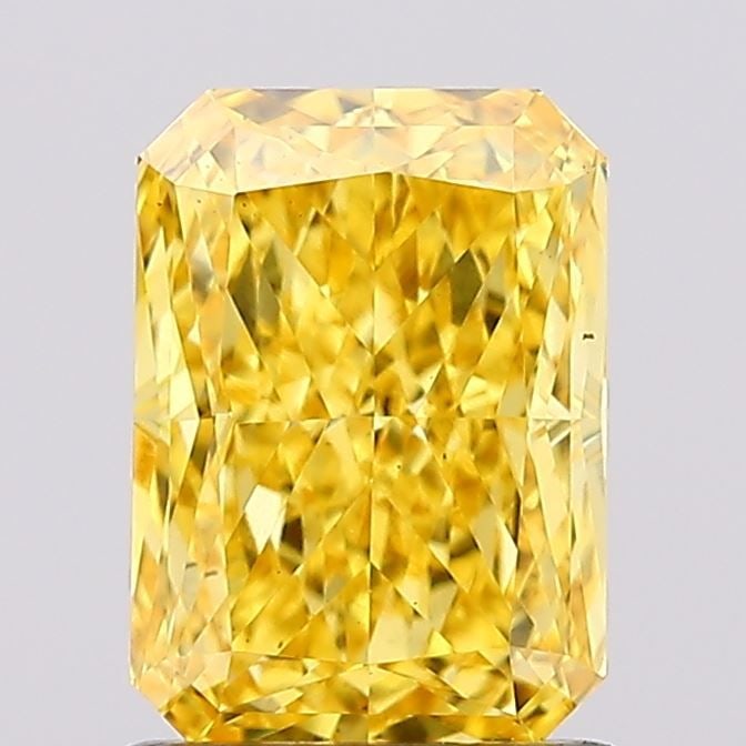 Loose Diamond - RADIANT 1.33ct Fancy Vivid Yellow VS1: Loose Diamond - RADIANT 1.33ct Fancy Vivid Yellow VS1 Source: This is a real non-mined Diamond that has been grown in a lab Shape: RADIANT Carats: 1.33 Color: Fancy Vivid Yellow Certification: IGI Vid