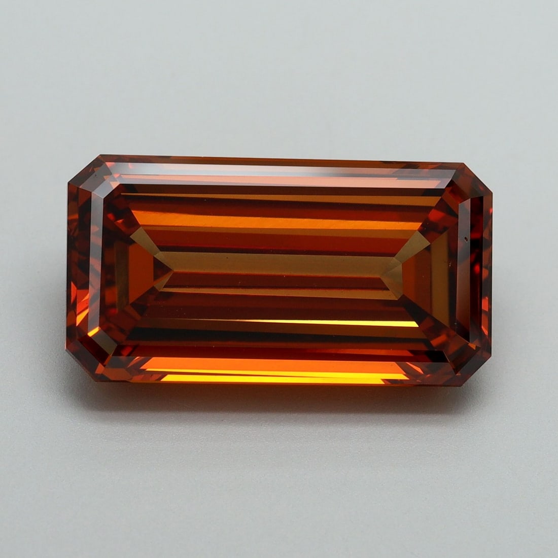 Loose Diamond - EMERALD 9.01ct Fancy Vivid Orange VS2: Loose Diamond - EMERALD 9.01ct Fancy Vivid Orange VS2 Source: This is a real non-mined Diamond that has been grown in a lab Shape: EMERALD Carats: 9.01 Color: Fancy Vivid Orange Certification: IGI Vid