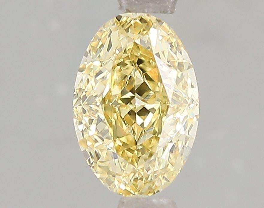 Loose Diamond - OVAL 1.49ct Fancy Vivid Yellow VS2: Loose Diamond - OVAL 1.49ct Fancy Vivid Yellow VS2 Source: This is a real non-mined Diamond that has been grown in a lab Shape: OVAL Carats: 1.49 Color: Fancy Vivid Yellow Certification: IGI Video: