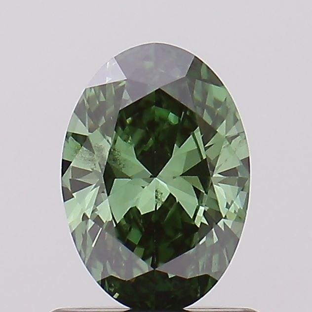 Loose Diamond - OVAL 0.7ct Fancy Vivid Green SI1: Loose Diamond - OVAL 0.7ct Fancy Vivid Green SI1 Source: This is a real non-mined Diamond that has been grown in a lab Shape: OVAL Carats: 0.7 Color: Fancy Vivid Green Certification: NONE Video: