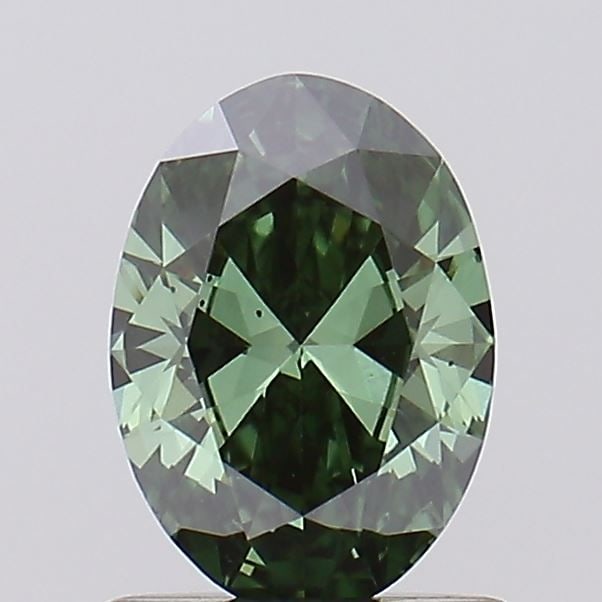 Loose Diamond - OVAL 0.72ct Fancy Vivid Green VS1: Loose Diamond - OVAL 0.72ct Fancy Vivid Green VS1 Source: This is a real non-mined Diamond that has been grown in a lab Shape: OVAL Carats: 0.72 Color: Fancy Vivid Green Certification: IGI Video: