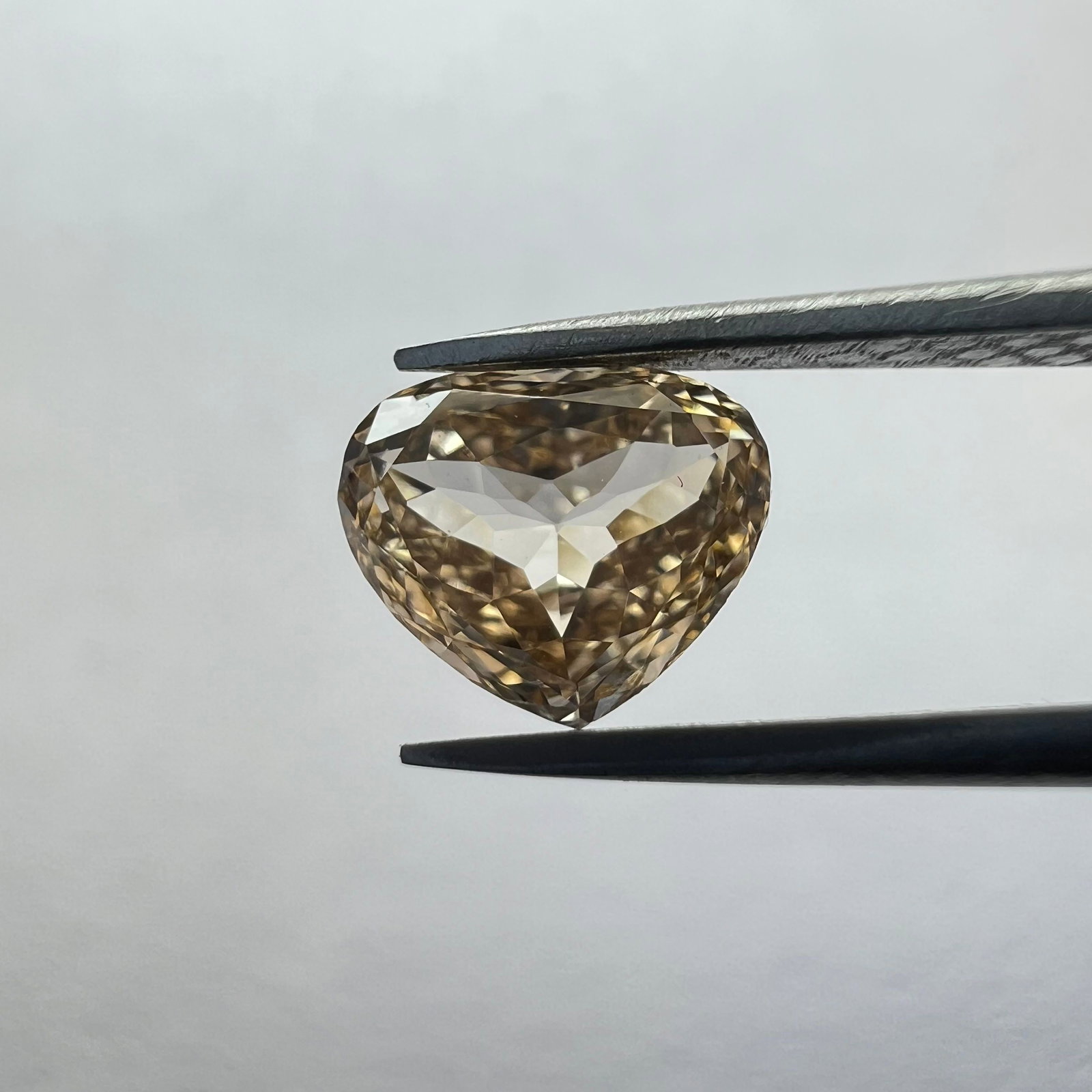 Loose Diamond - HEART 0.36ct Brown VVS1: Loose Diamond - HEART 0.36ct Brown VVS1 Source: This is a real non-mined Diamond that has been grown in a lab Shape: HEART Carats: 0.36 Color: Brown Certification: NONE The Diamond Depot Guarantee: Al
