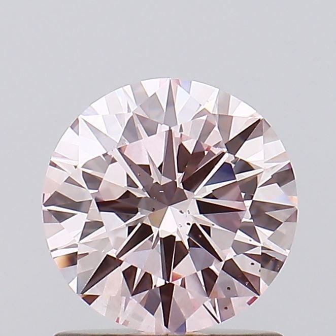 Loose Diamond - ROUND 1.01ct Fancy Pink SI1: Loose Diamond - ROUND 1.01ct Fancy Pink SI1 Source: This is a real non-mined Diamond that has been grown in a lab Shape: ROUND Carats: 1.01 Color: Fancy Pink Certification: IGI Video: