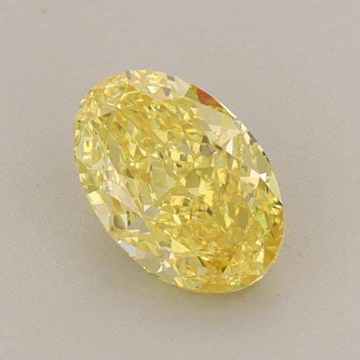 Loose Diamond - OVAL 0.73ct Fancy Vivid Yellow VS1: Loose Diamond - OVAL 0.73ct Fancy Vivid Yellow VS1 Source: This is a real non-mined Diamond that has been grown in a lab Shape: OVAL Carats: 0.73 Color: Fancy Vivid Yellow Certification: IGI Video: