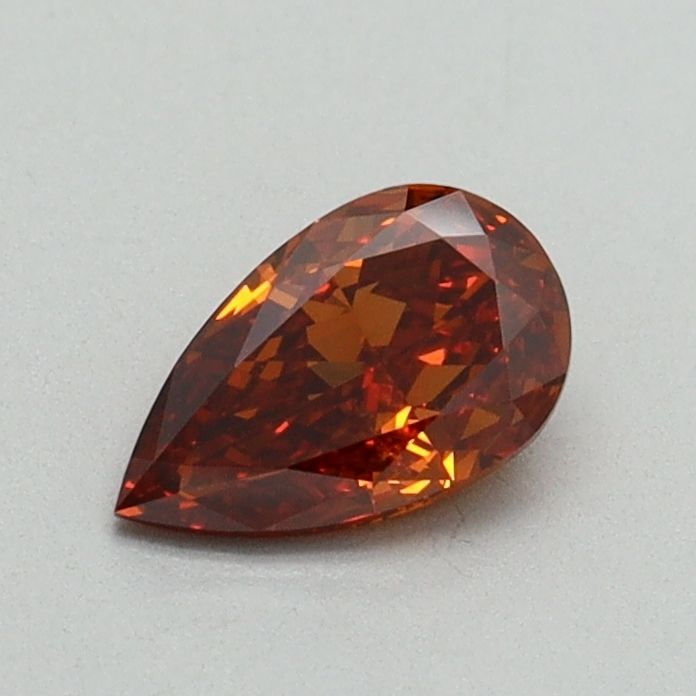 Loose Diamond - PEAR 0.5ct Fancy Orange VVS2: Loose Diamond - PEAR 0.5ct Fancy Orange VVS2 Source: This is a real non-mined Diamond that has been grown in a lab Shape: PEAR Carats: 0.5 Color: Fancy Orange Certification: IGI Video: