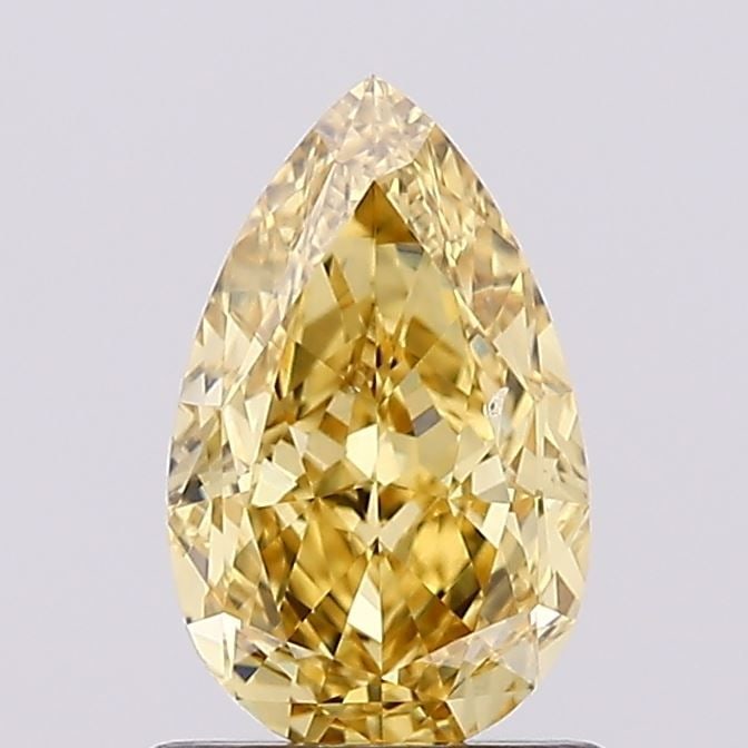 Loose Diamond - PEAR 1.07ct Fancy Vivid Yellow VS2: Loose Diamond - PEAR 1.07ct Fancy Vivid Yellow VS2 Source: This is a real non-mined Diamond that has been grown in a lab Shape: PEAR Carats: 1.07 Color: Fancy Vivid Yellow Certification: IGI Video: