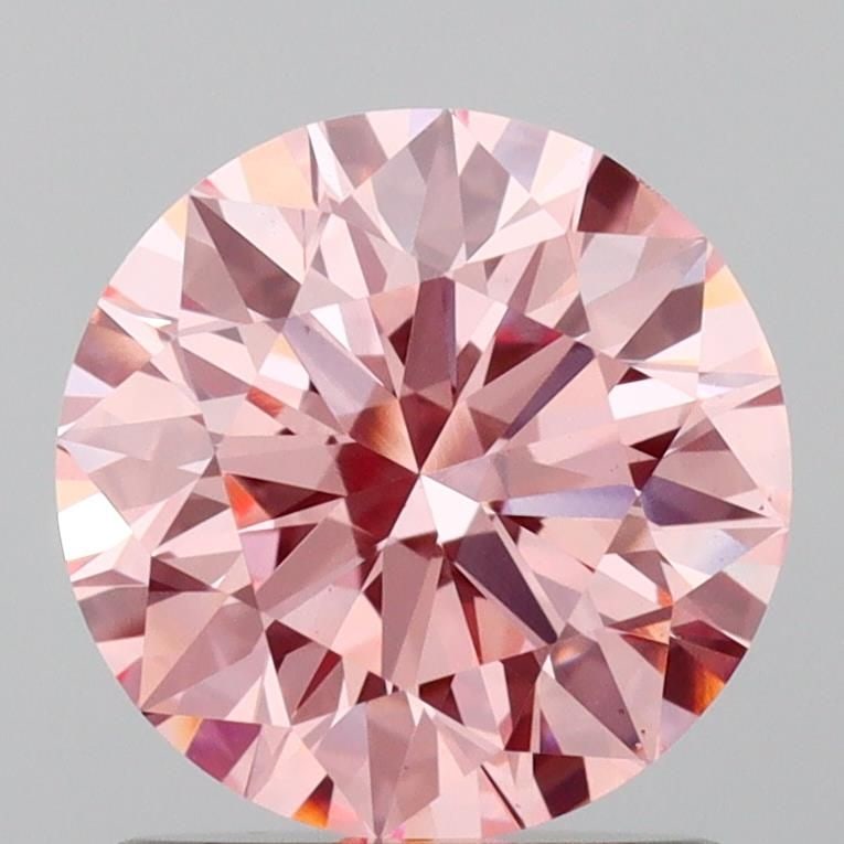 Ideal Loose Diamond - ROUND 1.5ct Fancy Vivid Pink VS1: Ideal Loose Diamond - ROUND 1.5ct Fancy Vivid Pink VS1 Source: This is a real non-mined Diamond that has been grown in a lab Shape: ROUND Carats: 1.5 Color: Fancy Vivid Pink Certification: IGI Video:
