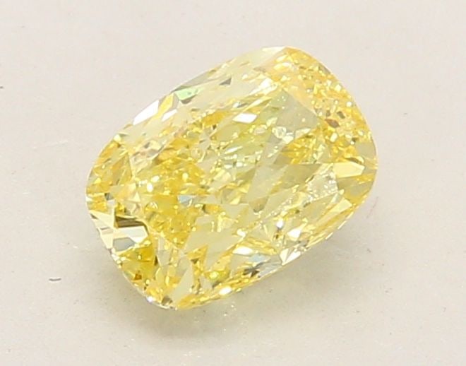 Loose Diamond - CUSHION MODIFIED 0.93ct Fancy Intense Yellow VVS2: Loose Diamond - CUSHION MODIFIED 0.93ct Fancy Intense Yellow VVS2 Source: This is a real non-mined Diamond that has been grown in a lab Shape: CUSHION MODIFIED Carats: 0.93 Color: Fancy Intense Yellow