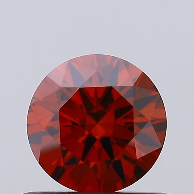 Loose Diamond - ROUND 0.57ct Fancy Deep Orange VS2: Loose Diamond - ROUND 0.57ct Fancy Deep Orange VS2 Source: This is a real non-mined Diamond that has been grown in a lab Shape: ROUND Carats: 0.57 Color: Fancy Deep Orange Certification: IGI Video: