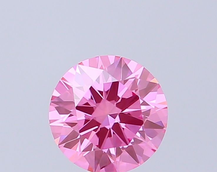 Ideal Loose Diamond - ROUND 0.55ct Fancy Vivid Pink VVS2: Ideal Loose Diamond - ROUND 0.55ct Fancy Vivid Pink VVS2 Source: This is a real non-mined Diamond that has been grown in a lab Shape: ROUND Carats: 0.55 Color: Fancy Vivid Pink Certification: IGI Vide