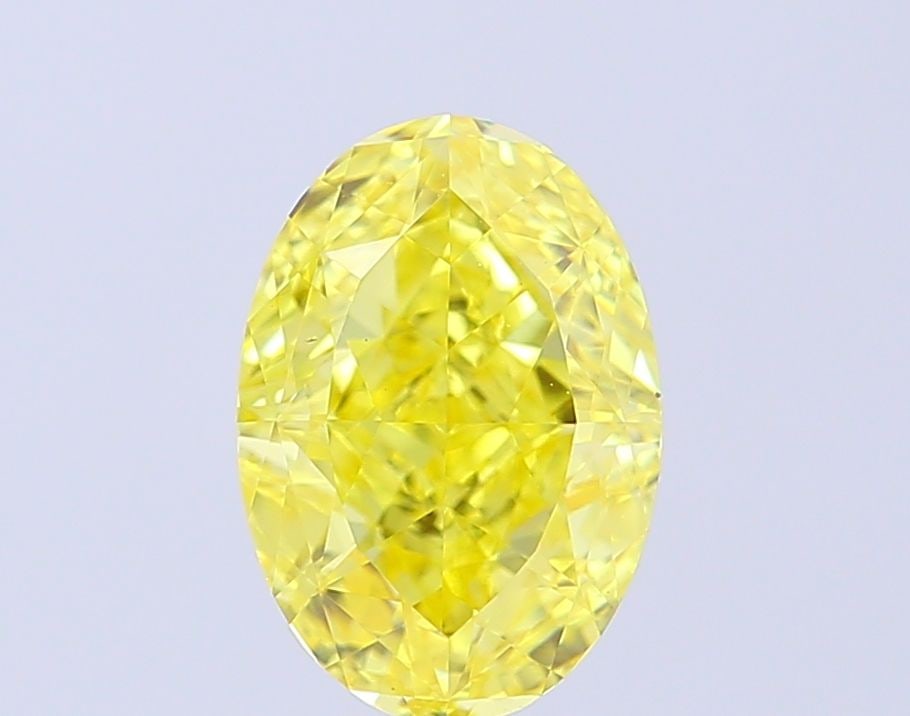 Loose Diamond - OVAL 1.66ct Fancy Vivid Yellow VS1: Loose Diamond - OVAL 1.66ct Fancy Vivid Yellow VS1 Source: This is a real non-mined Diamond that has been grown in a lab Shape: OVAL Carats: 1.66 Color: Fancy Vivid Yellow Certification: IGI Video: