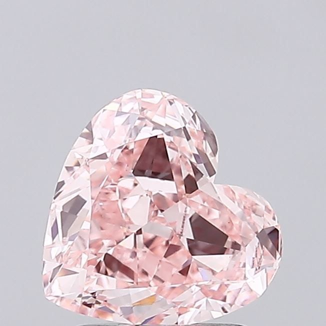 Loose Diamond - HEART 2.0ct Fancy Vivid Pink VS1: Loose Diamond - HEART 2.0ct Fancy Vivid Pink VS1 Source: This is a real non-mined Diamond that has been grown in a lab Shape: HEART Carats: 2.0 Color: Fancy Vivid Pink Certification: IGI Video: