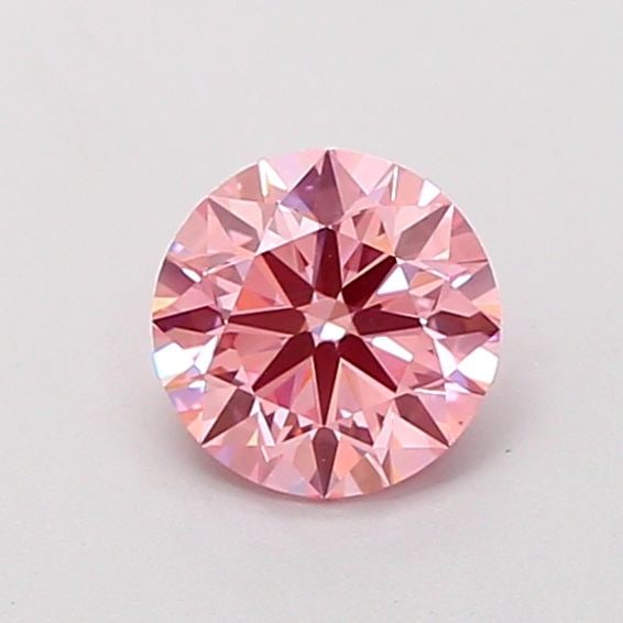 Ideal Loose Diamond - ROUND 0.94ct Fancy Vivid Pink VS2: Ideal Loose Diamond - ROUND 0.94ct Fancy Vivid Pink VS2 Source: This is a real non-mined Diamond that has been grown in a lab Shape: ROUND Carats: 0.94 Color: Fancy Vivid Pink Certification: IGI Video