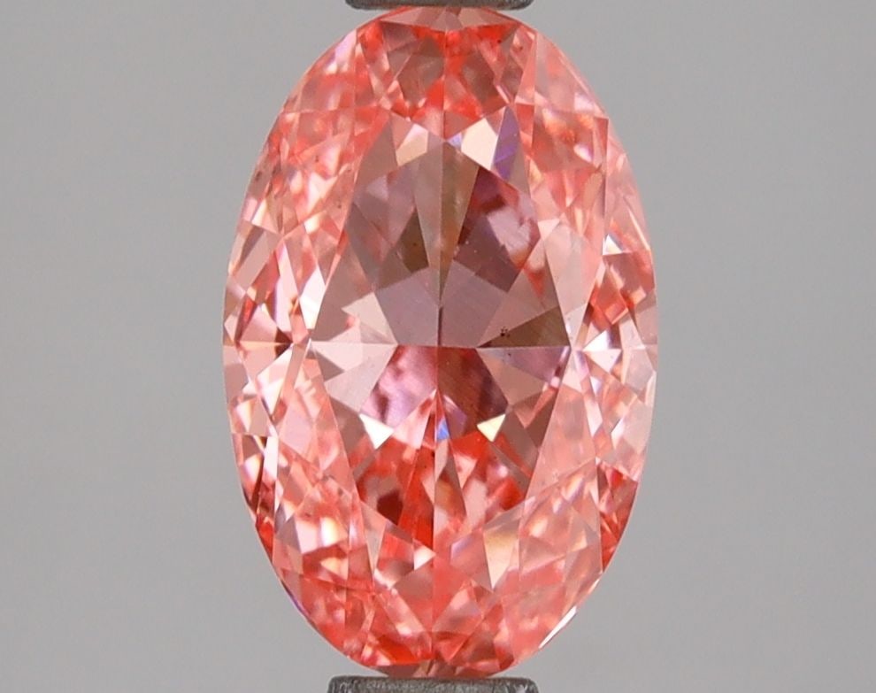 Loose Diamond - OVAL 2.03ct Fancy Vivid Pink VS2: Loose Diamond - OVAL 2.03ct Fancy Vivid Pink VS2 Source: This is a real non-mined Diamond that has been grown in a lab Shape: OVAL Carats: 2.03 Color: Fancy Vivid Pink Certification: IGI Video: