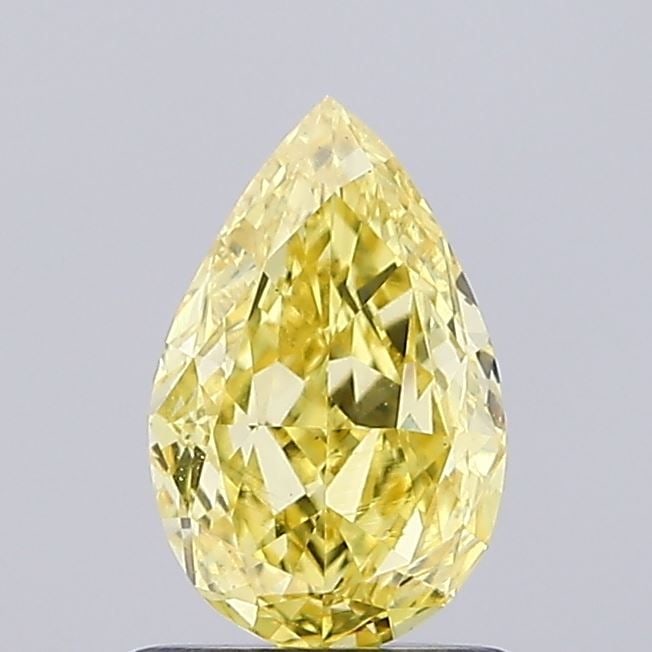 Loose Diamond - PEAR 0.77ct Fancy Vivid Yellow VS1: Loose Diamond - PEAR 0.77ct Fancy Vivid Yellow VS1 Source: This is a real non-mined Diamond that has been grown in a lab Shape: PEAR Carats: 0.77 Color: Fancy Vivid Yellow Certification: NONE Video: