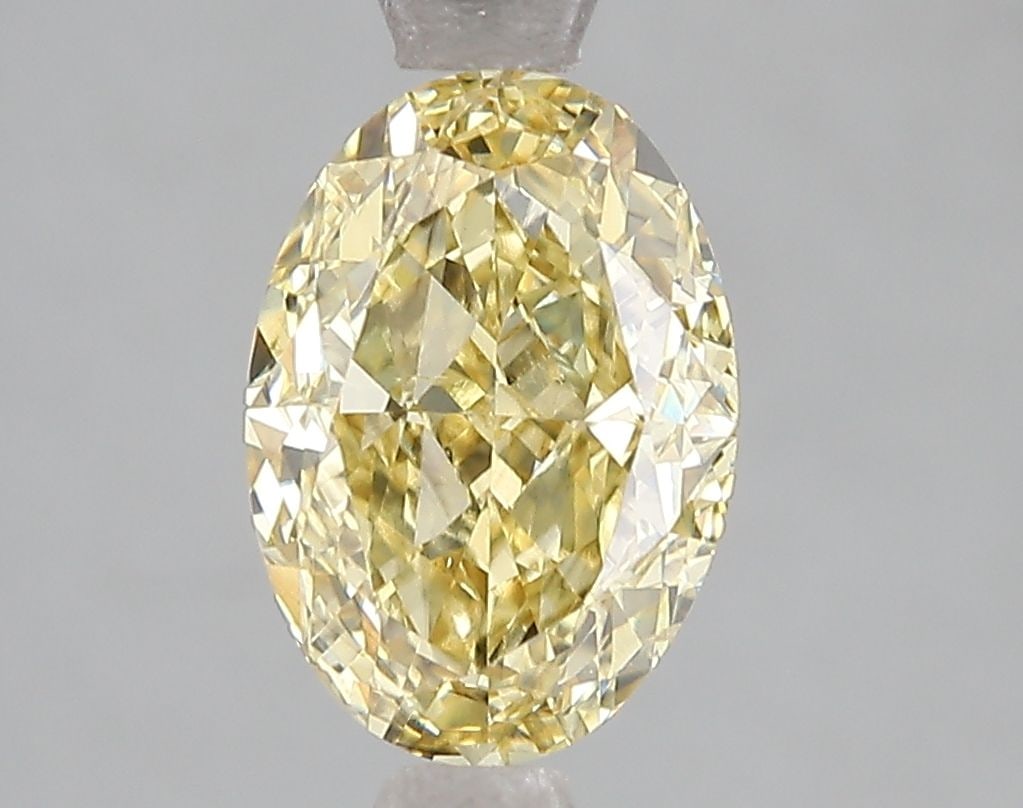 Loose Diamond - OVAL 2.5ct Fancy Vivid Yellow VS2: Loose Diamond - OVAL 2.5ct Fancy Vivid Yellow VS2 Source: This is a real non-mined Diamond that has been grown in a lab Shape: OVAL Carats: 2.5 Color: Fancy Vivid Yellow Certification: IGI Video: