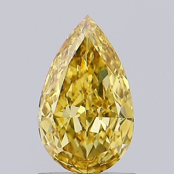 Loose Diamond - PEAR 0.92ct Fancy Vivid Brownish Yellow VS2: Loose Diamond - PEAR 0.92ct Fancy Vivid Brownish Yellow VS2 Source: This is a real non-mined Diamond that has been grown in a lab Shape: PEAR Carats: 0.92 Color: Fancy Vivid Brownish Yellow Certificat