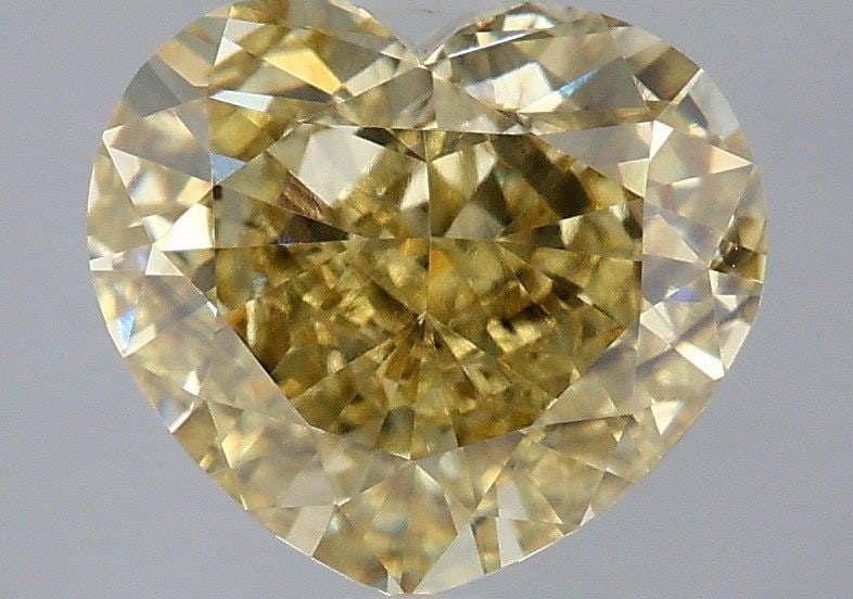 Loose Diamond - HEART 3.56ct Fancy Yellow VS2: Loose Diamond - HEART 3.56ct Fancy Yellow VS2 Source: This is a real non-mined Diamond that has been grown in a lab Shape: HEART Carats: 3.56 Color: Fancy Yellow Certification: IGI Video: