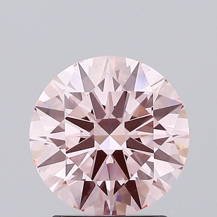 Ideal Loose Diamond - ROUND 1.78ct Fancy Vivid Pink VS1: Ideal Loose Diamond - ROUND 1.78ct Fancy Vivid Pink VS1 Source: This is a real non-mined Diamond that has been grown in a lab Shape: ROUND Carats: 1.78 Color: Fancy Vivid Pink Certification: IGI Video
