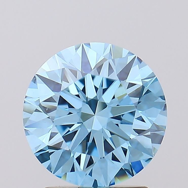 Ideal Loose Diamond - ROUND 2.03ct Fancy Vivid Blue VS1: Ideal Loose Diamond - ROUND 2.03ct Fancy Vivid Blue VS1 Source: This is a real non-mined Diamond that has been grown in a lab Shape: ROUND Carats: 2.03 Color: Fancy Vivid Blue Certification: IGI Video