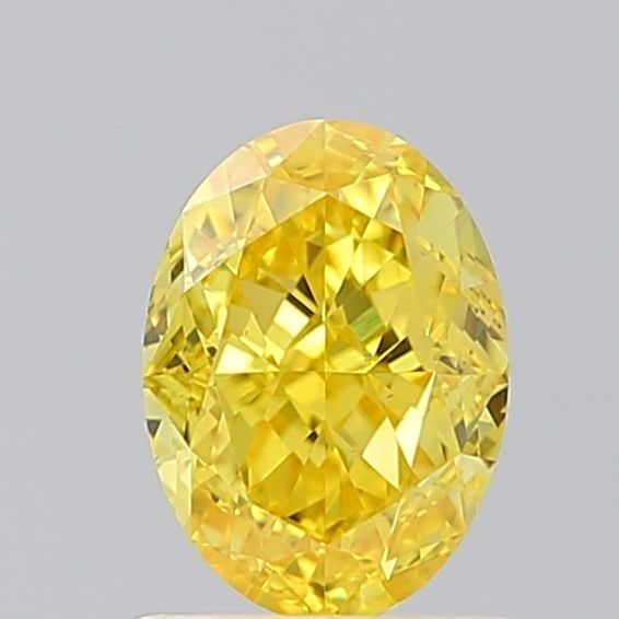 Loose Diamond - OVAL 1.02ct Fancy Vivid Yellow VS2: Loose Diamond - OVAL 1.02ct Fancy Vivid Yellow VS2 Source: This is a real non-mined Diamond that has been grown in a lab Shape: OVAL Carats: 1.02 Color: Fancy Vivid Yellow Certification: IGI Video: