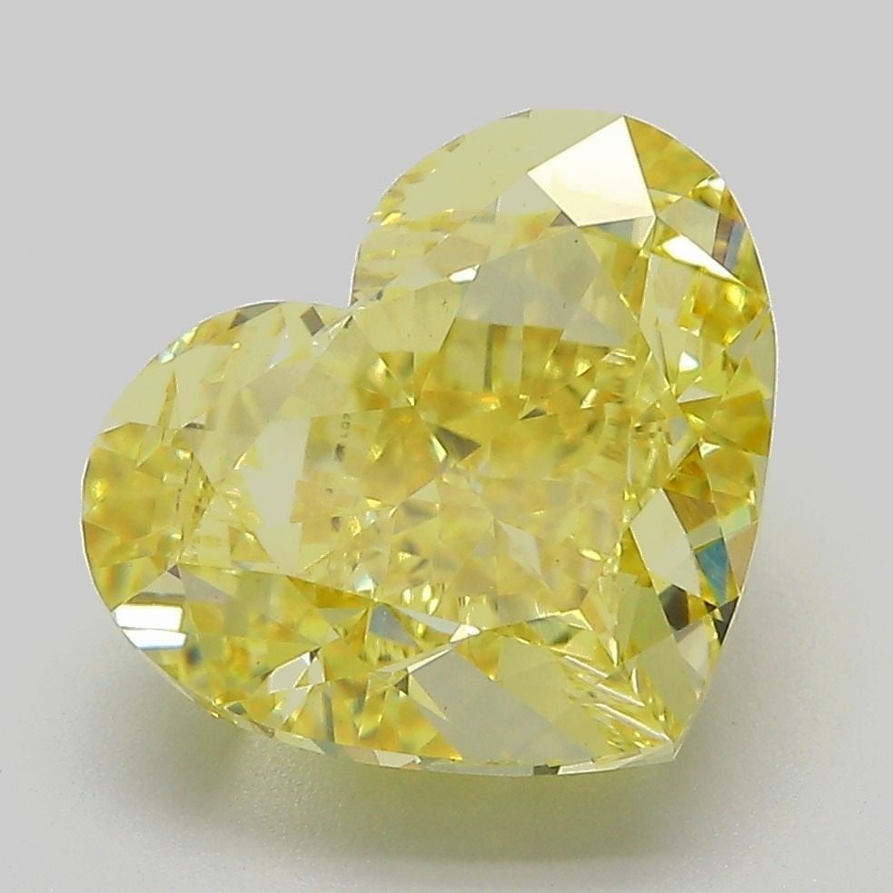 Loose Diamond - HEART 6.13ct Fancy Intense Yellow VVS2: Loose Diamond - HEART 6.13ct Fancy Intense Yellow VVS2 Source: This is a real non-mined Diamond that has been grown in a lab Shape: HEART Carats: 6.13 Color: Fancy Intense Yellow Certification: IGI Vi
