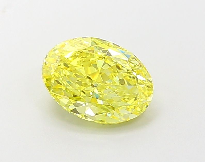 Loose Diamond - OVAL 2.05ct Fancy Vivid Yellow VVS2: Loose Diamond - OVAL 2.05ct Fancy Vivid Yellow VVS2 Source: This is a real non-mined Diamond that has been grown in a lab Shape: OVAL Carats: 2.05 Color: Fancy Vivid Yellow Certification: IGI Video: