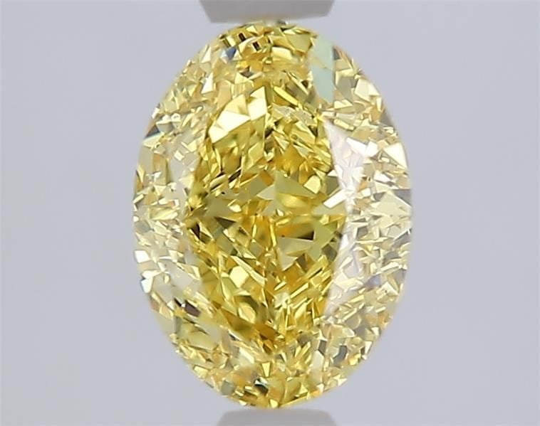 Loose Diamond - OVAL 1.6ct Fancy Vivid Yellow VS2: Loose Diamond - OVAL 1.6ct Fancy Vivid Yellow VS2 Source: This is a real non-mined Diamond that has been grown in a lab Shape: OVAL Carats: 1.6 Color: Fancy Vivid Yellow Certification: IGI Video: