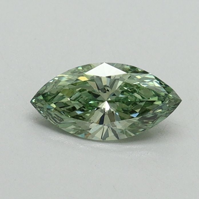 Loose Diamond - MARQUISE 0.33ct Fancy Vivid Green SI1: Loose Diamond - MARQUISE 0.33ct Fancy Vivid Green SI1 Source: This is a real non-mined Diamond that has been grown in a lab Shape: MARQUISE Carats: 0.33 Color: Fancy Vivid Green Certification: IGI Vid