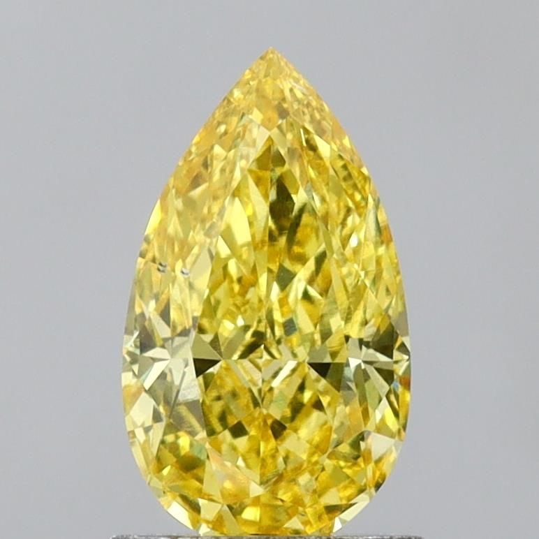 Loose Diamond - PEAR 1.12ct Fancy Vivid Yellow VS2: Loose Diamond - PEAR 1.12ct Fancy Vivid Yellow VS2 Source: This is a real non-mined Diamond that has been grown in a lab Shape: PEAR Carats: 1.12 Color: Fancy Vivid Yellow Certification: IGI Video: