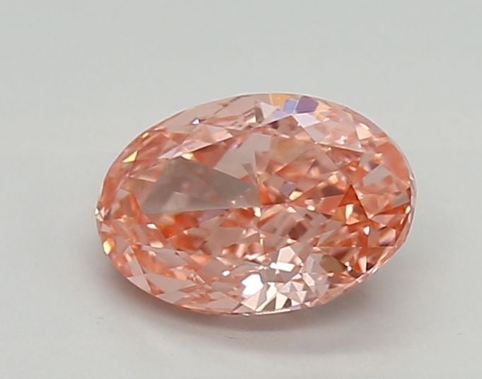 Loose Diamond - OVAL 0.94ct Fancy Vivid Pink VVS2: Loose Diamond - OVAL 0.94ct Fancy Vivid Pink VVS2 Source: This is a real non-mined Diamond that has been grown in a lab Shape: OVAL Carats: 0.94 Color: Fancy Vivid Pink Certification: IGI Video: