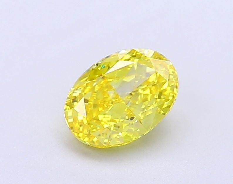 Loose Diamond - OVAL 1.08ct Fancy Vivid Yellow VS1: Loose Diamond - OVAL 1.08ct Fancy Vivid Yellow VS1 Source: This is a real non-mined Diamond that has been grown in a lab Shape: OVAL Carats: 1.08 Color: Fancy Vivid Yellow Certification: IGI Video:
